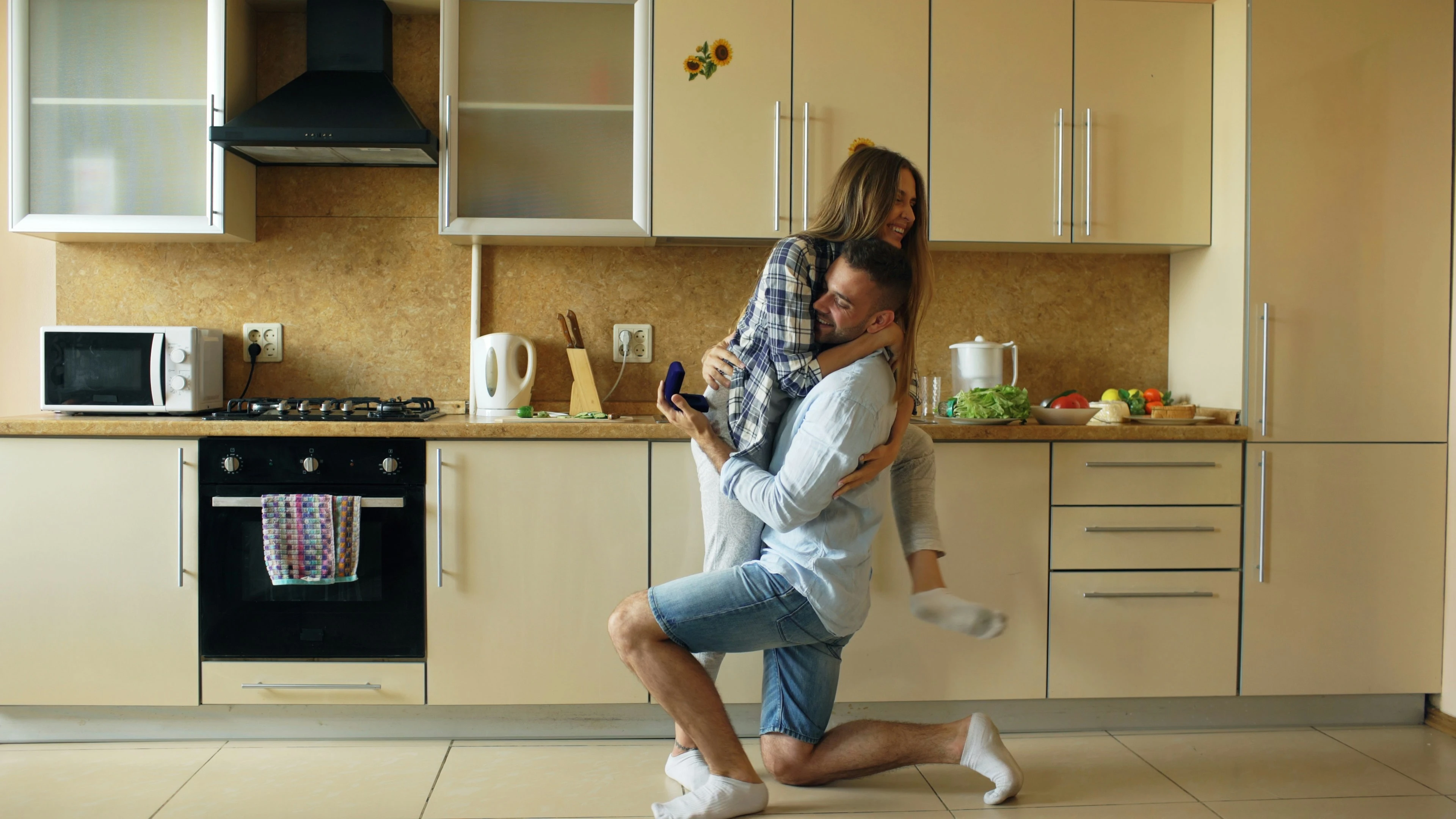 Couple celebrating their engagement — Village Mortgage helps you reach life's milestones